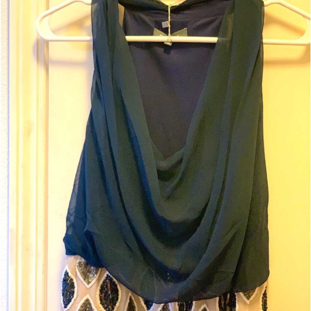 Gorgeous Gracia semi formal short dress with scoop neck and sequin skirt